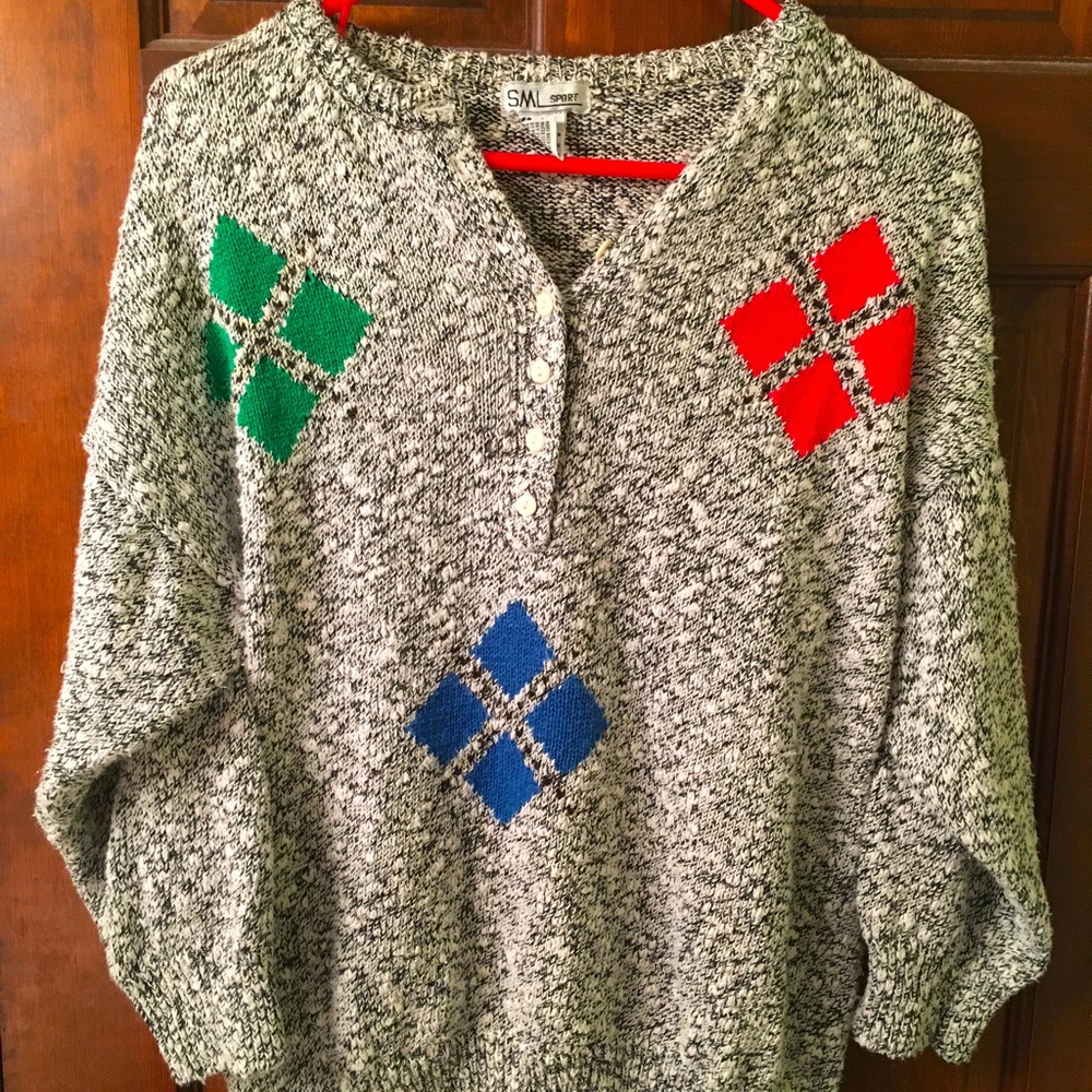 VTG 80s sweater with banded bottom and cute diamond pattern. By SML Sport Sz L